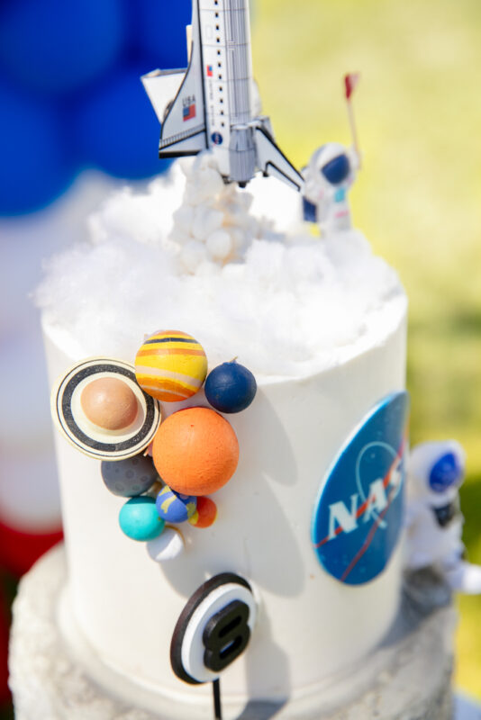 Birthday cake at space themed birthday party setup in Mbombela