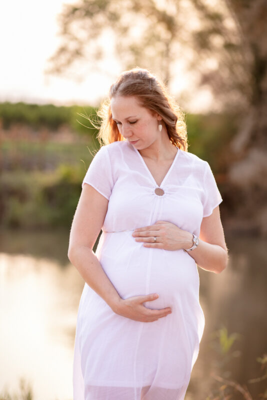 Elegant maternity portrait of pregnant woman outdoors in Nelspruit landscape