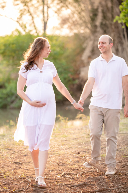 Couple celebrating pregnancy during nature maternity photoshoot in Mbombela
