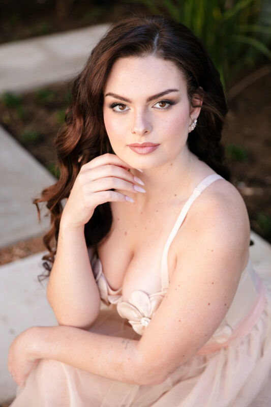 lassic bridal beauty look with soft smokey eyes, glowing makeup, and elegant wedding hairstyle